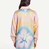 Back view of KABE SHOP INC Hibiscus Top in pastel silk with a large floral print and relaxed button-down silhouette.