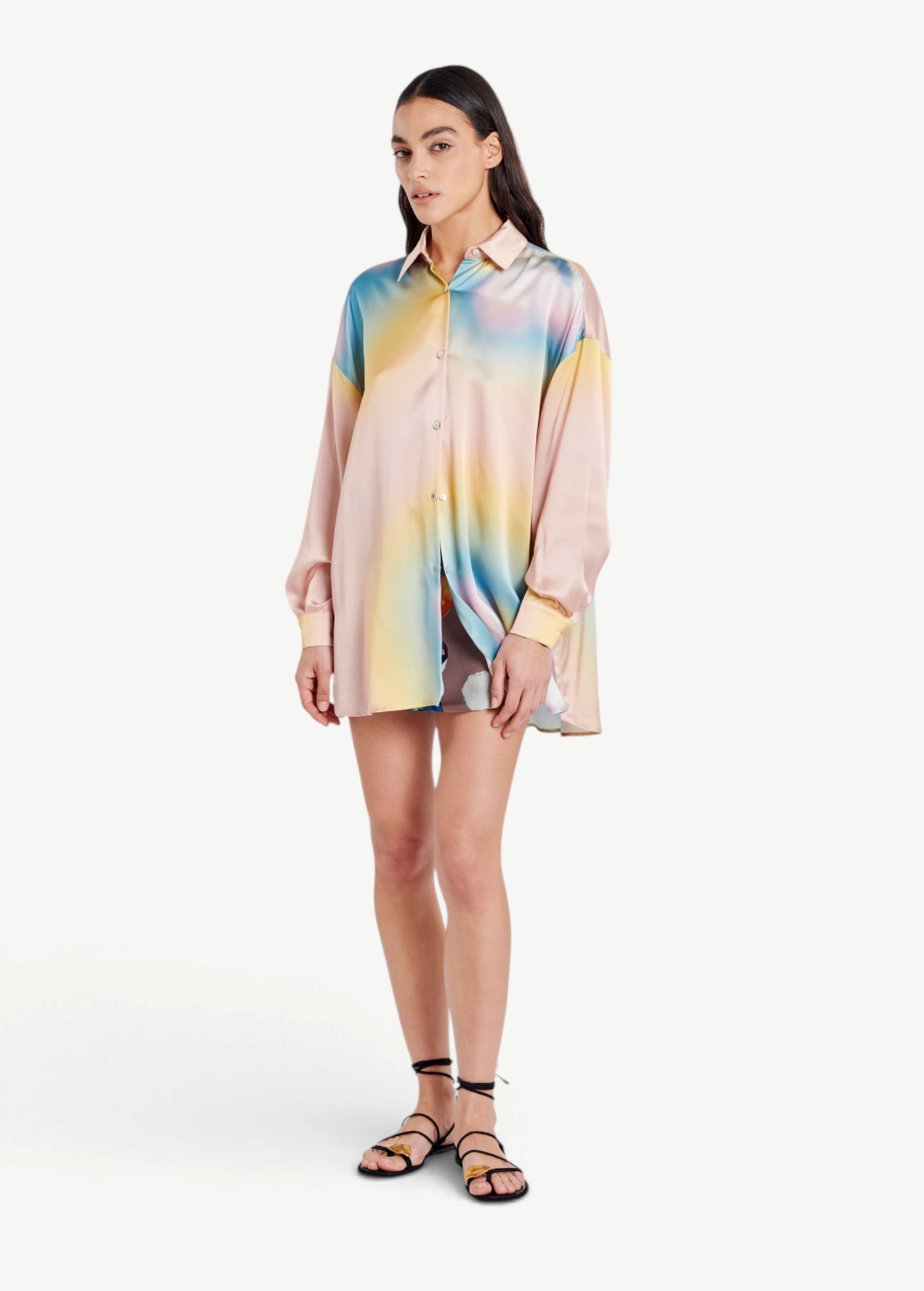 Model wearing a KABE SHOP INC Hibiscus Top in multicolored silk with a button-down collar and relaxed fit