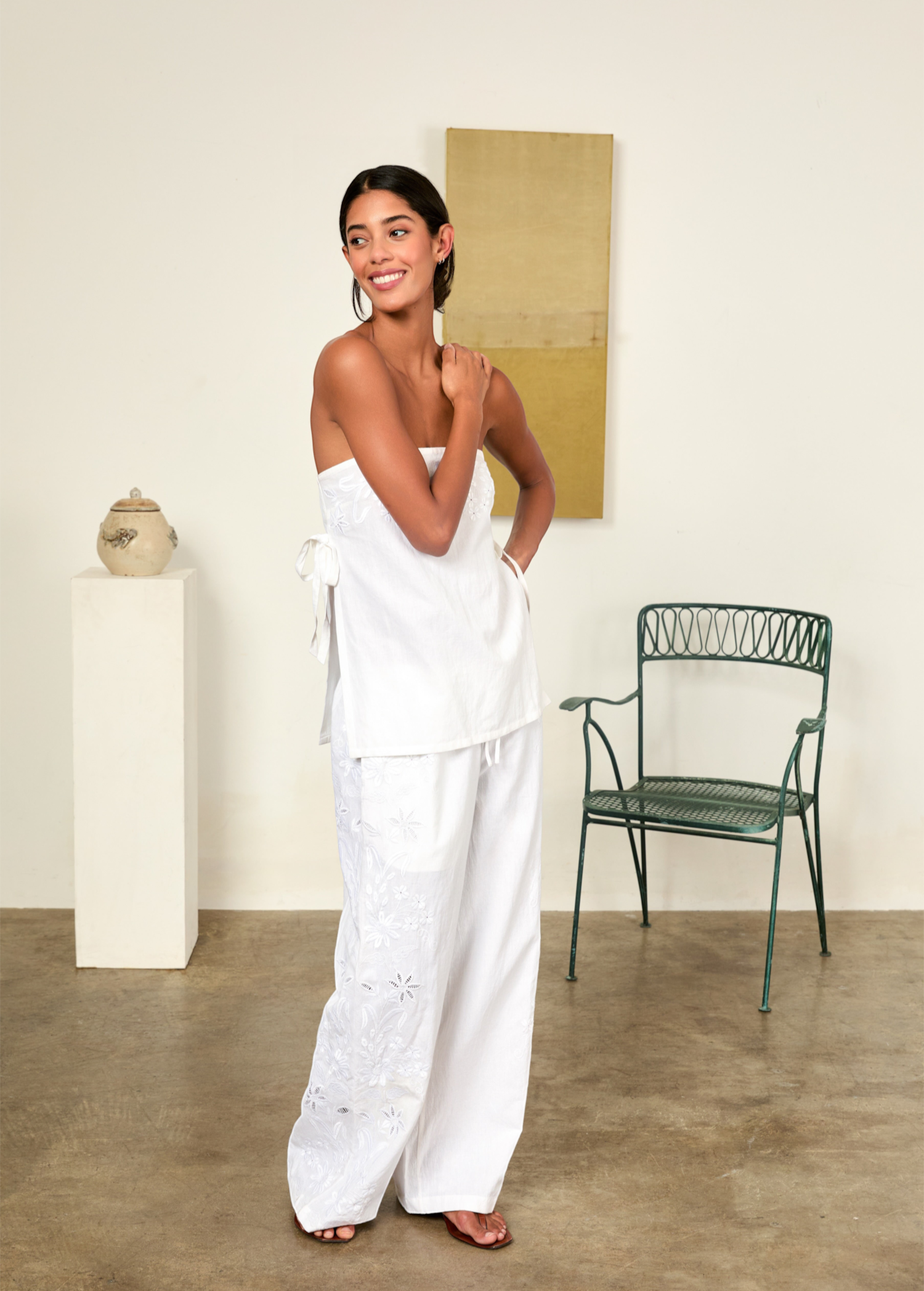 KABE SHOP INC Sebastian strapless white top with side ties paired with matching floral embroidered wide-leg trousers