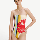 KABE SHOP INC Ulla one-piece swimsuit featuring a multi-colored vertical stripe pattern and a large red floral motif.