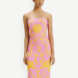 KABE SHOP INC Daphne Dress in pink with yellow floral print, strapless midi silhouette on a model
