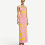 Model wearing a KABE SHOP INC Daphne strapless pink maxi dress with yellow floral print and ruched side detailing