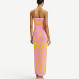 KABE SHOP INC Daphne dress in pink with yellow floral print, strapless maxi silhouette worn by a model, back view