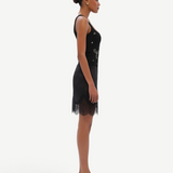 KABE SHOP INC Dasne black bodysuit with square neckline and front embellishment worn by a model in profile view