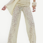 Rocio Trouser in cream-colored wide-leg lace with a vintage-inspired floral pattern, high ruched waistband, and draped silhouette.