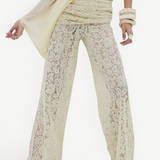 Rocio Trouser in cream-colored wide-leg lace with a vintage-inspired floral pattern, high ruched waistband, and draped silhouette.