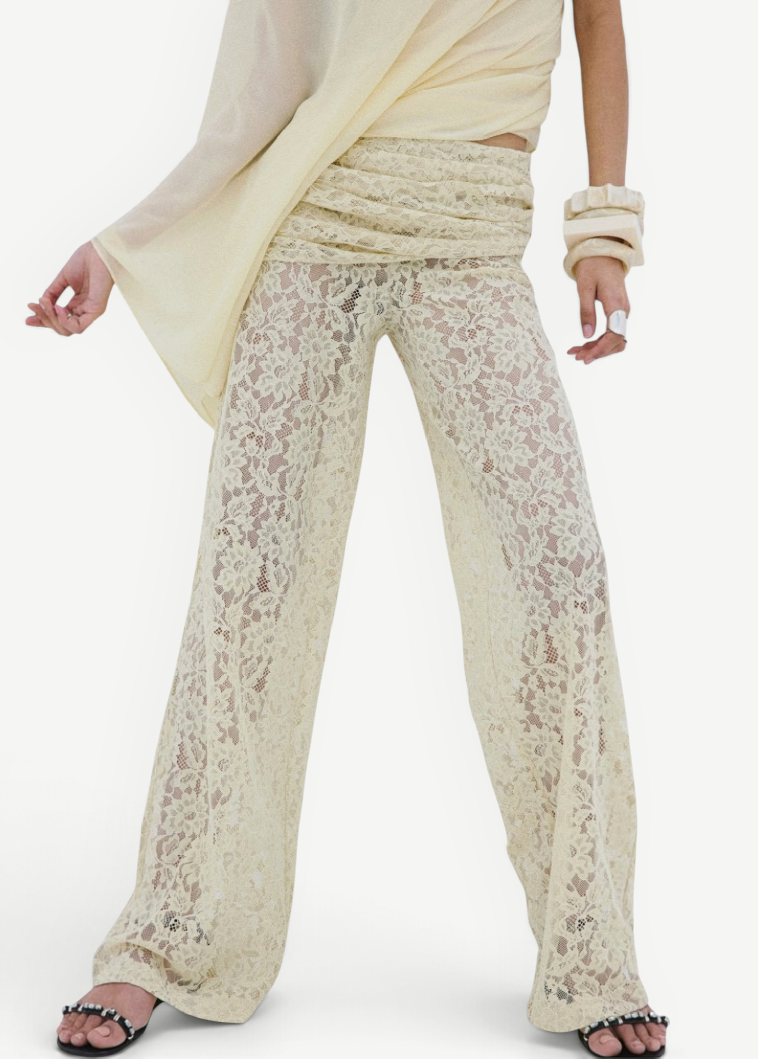 Rocio Trouser in cream-colored wide-leg lace with a vintage-inspired floral pattern, high ruched waistband, and draped silhouette.