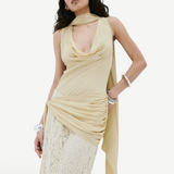 Model wearing KABE SHOP INC Rosa maxi dress in antique yellow viscose georgette with delicate lace skirt detailing.