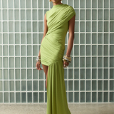 Model wearing a lime green KABE SHOP INC Ravenna mini dress with sculpted draping and an asymmetric sash skirt.