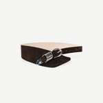 KABE SHOP INC Alcott brown suede belt featuring an asymmetrical design and signature silver five-ring hardware.