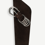 KABE SHOP INC Alcott suede belt in dark brown featuring an asymmetrical shape and silver-tone five-ring hardware.