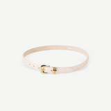KABE SHOP INC Altura belt in cream Italian calfskin leather with a polished gold curved buckle on a neutral background