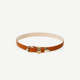 KABE SHOP INC Hollyhock belt in tan Italian calfskin leather with 24K gold hardware and a signature ribbed buckle.