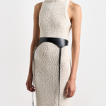 Model wearing KABE SHOP INC Laisse black Italian calfskin garter belt over a textured cream knit sleeveless dress