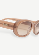 KABE SHOP INC Valentina oval sunglasses in translucent beige Italian acetate with gold DMY logo detail