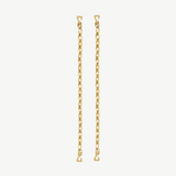 Two pieces from the Lola Swimwear collection, featuring gold chain earrings with small heart-shaped hooks at each end reminiscent of delicate jewelry straps, are displayed vertically against a plain, light beige background.