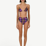 Model wearing KABE SHOP INC Dolores Top Classic in purple plaid with pearl-embellished straps and matching bottoms.