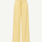 Pale yellow Damian Pant with a wide-leg silhouette and an elastic drawstring waistband, offering a versatile wardrobe staple for a polished style.