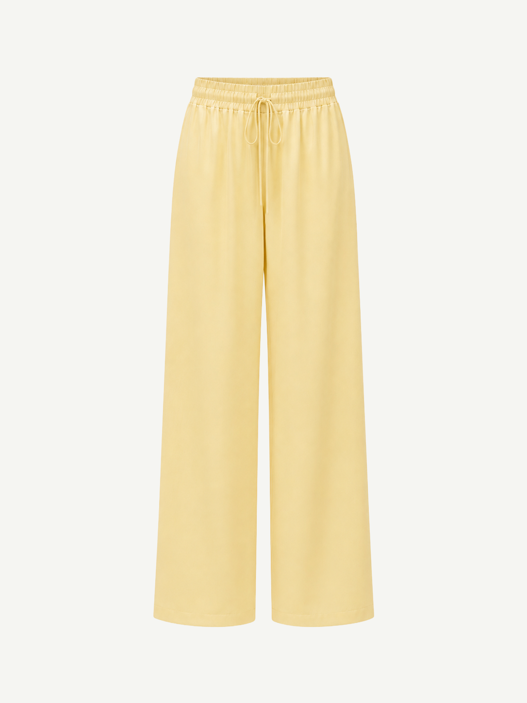 Pale yellow Damian Pant with a wide-leg silhouette and an elastic drawstring waistband, offering a versatile wardrobe staple for a polished style.