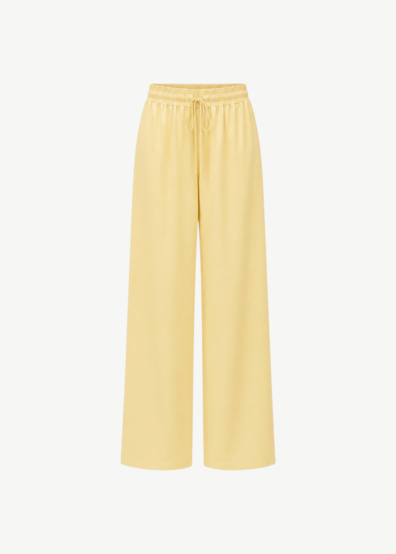 Pale yellow Damian Pant with a wide-leg silhouette and an elastic drawstring waistband, offering a versatile wardrobe staple for a polished style.
