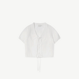 KABE SHOP INC Deiji Studios white cotton poplin top with collared V-neck, pintuck details, and drawcord hem.