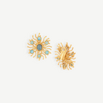KABE SHOP INC Sunshine earrings featuring gold-tone sunburst designs with blue Chalcedony and Larimar gemstones.