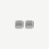 A pair of square-shaped, silver Elle Earrings with rounded edges and a ridged, textured surface pattern, accented with 14KT gold plate, displayed against a white background.