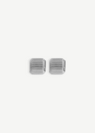 A pair of square-shaped, silver Elle Earrings with rounded edges and a ridged, textured surface pattern, accented with 14KT gold plate, displayed against a white background.