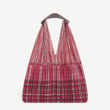 KABE SHOP INC Elziver bag featuring a vibrant pink plaid textile base with a lightweight mesh upper and woven handle.
