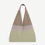 KABE SHOP INC Elziver bag featuring a tri-color geometric woven pattern in brown, purple, and green with striped straps.