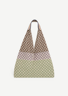 KABE SHOP INC Elziver bag featuring a tri-color geometric woven pattern in brown, purple, and green with striped straps.