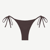 The Praia Bottom is a brown triangle bikini bottom with side ties, made from eco-friendly swimwear materials and shown against a white background.