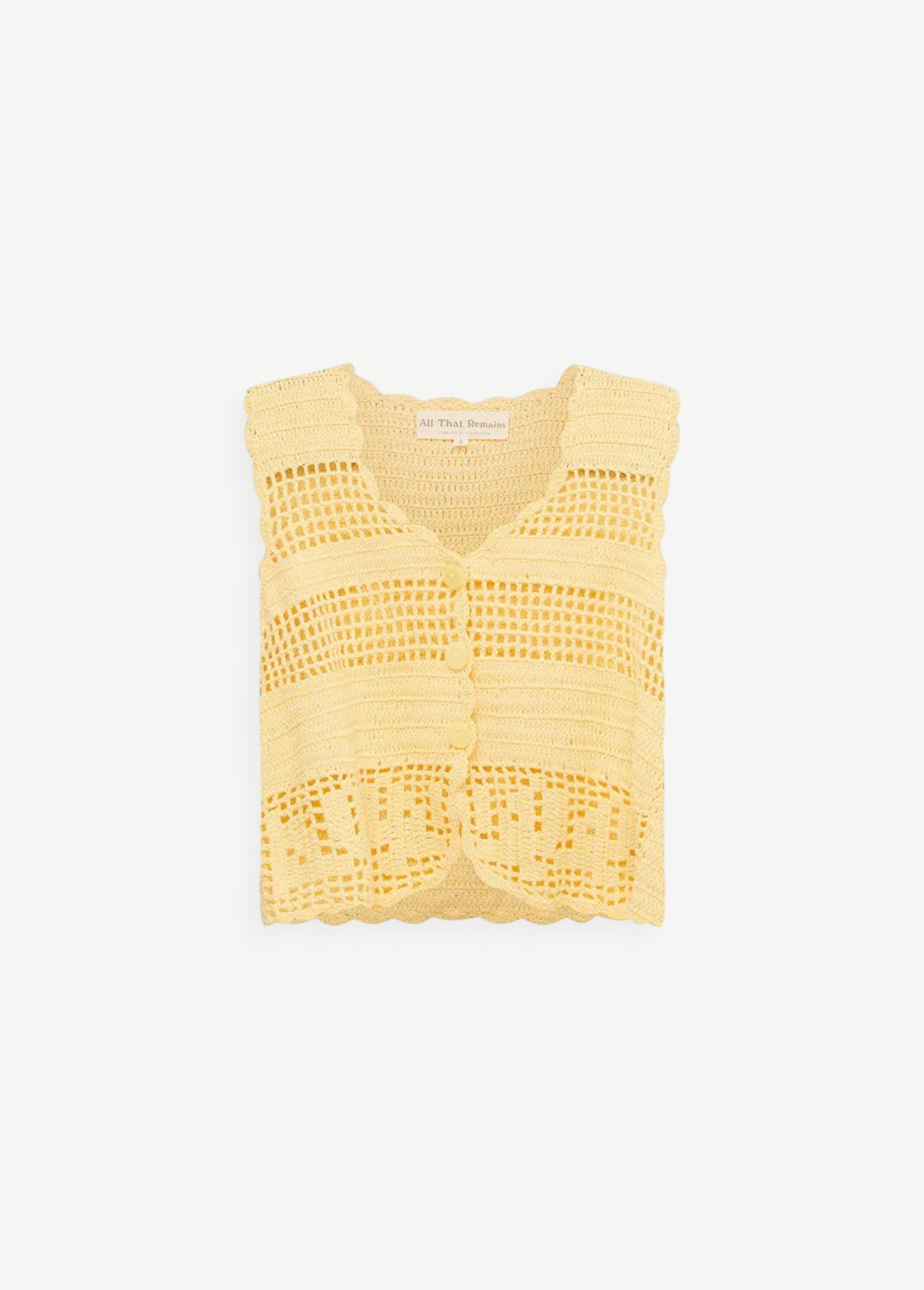 KABE SHOP INC Eva Vest in pale yellow featuring intricate handcrafted crochet detailing and a button-front closure.
