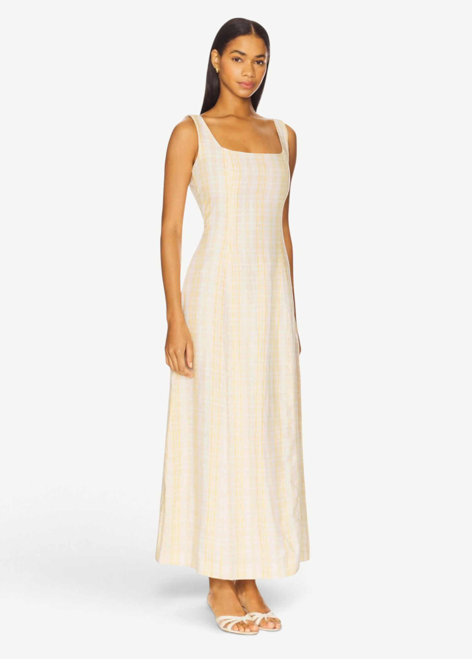Model wearing a KABE SHOP INC Lenice midi dress in cream and yellow plaid linen with a square neckline