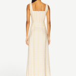 Back view of KABE SHOP INC Lenice midi dress in yellow plaid linen with a square neckline and smocked bodice