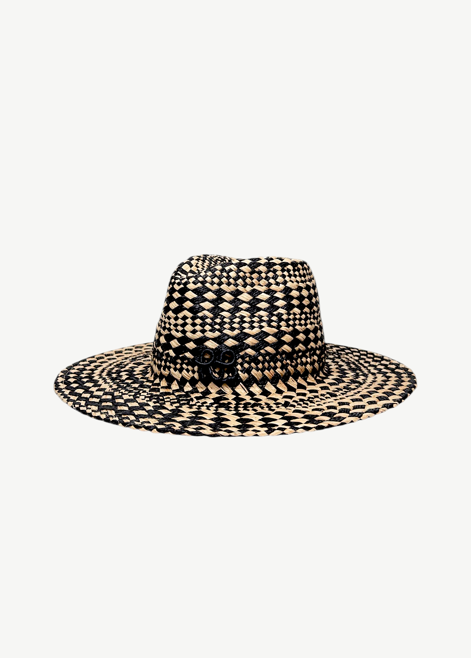 KABE SHOP INC straw fedora hat featuring a black and beige geometric rhomboidal pattern and a decorative side emblem.