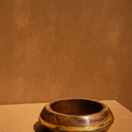KABE SHOP INC set of three sculptural wood and resin bangles featuring a natural wood grain and gold resin detail.