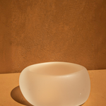 KABE SHOP INC sculptural beige resin bangle with a smooth, rounded minimalist design