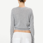 Back view of KABE SHOP INC Francis grey cashmere sweater with slim fit and cropped hem on a model