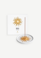KABE SHOP INC Soleil fine porcelain incense holder with a gold sun motif and matching decorative gift box
