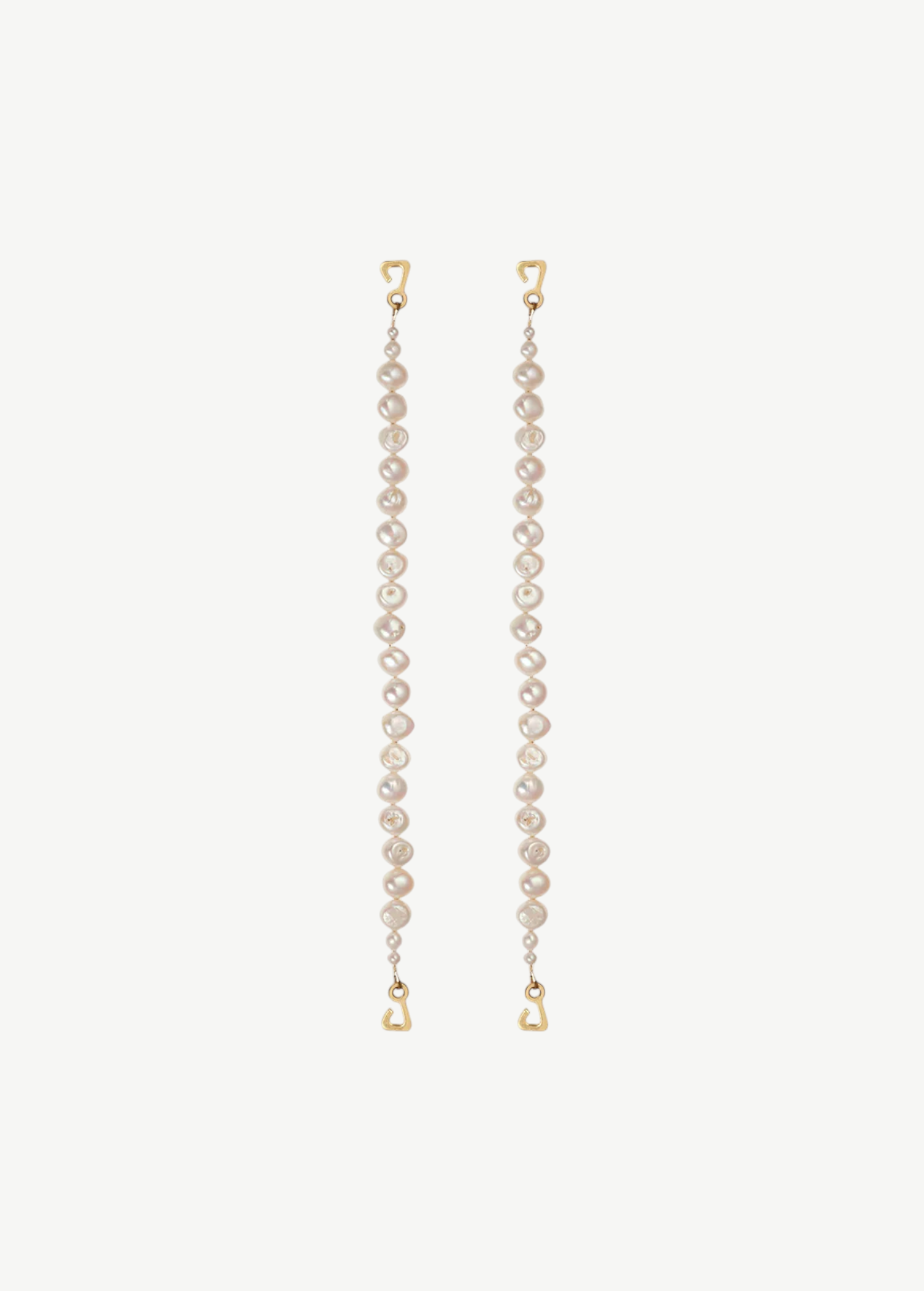 KABE SHOP INC Hydra Straps featuring delicate freshwater pearls on gold-toned hooks for an elegant feminine design.