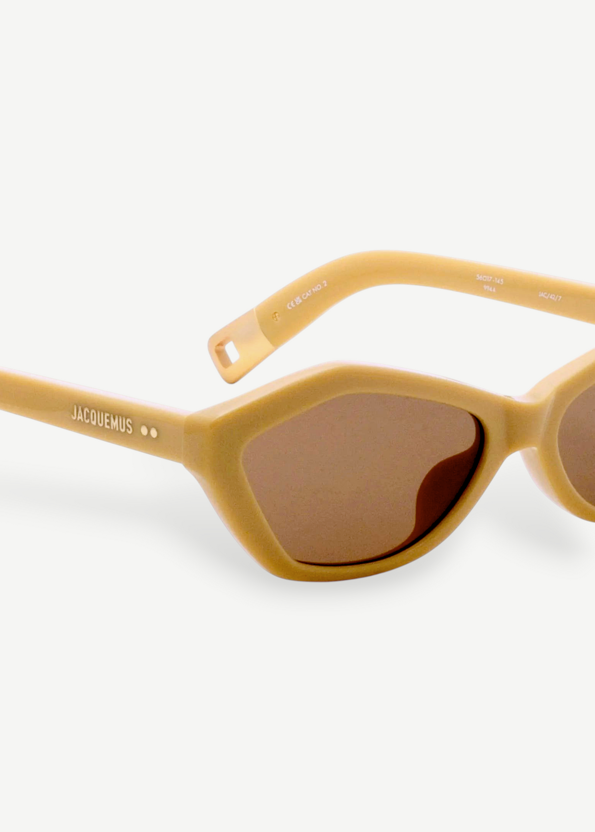 KABE SHOP INC Bambino sunglasses in beige acetate with angular frames, tobacco lenses, and gold temple detailing.