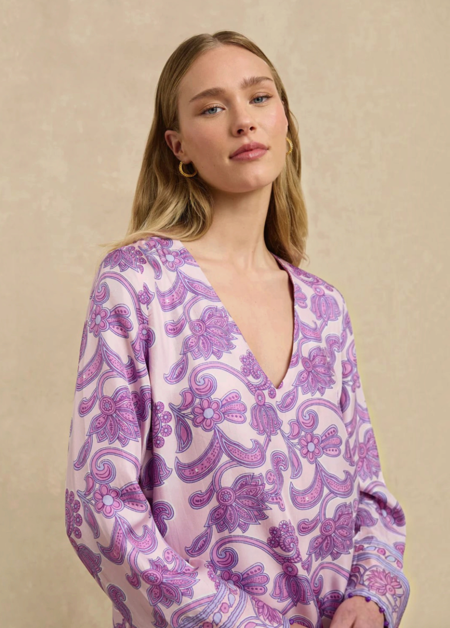 KABE SHOP INC Jaya dress featuring a relaxed tunic silhouette with a pink and purple paisley floral print