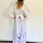 KABE SHOP INC white cotton kaftan dress with floral embroidery and wide sleeves worn with a black hat