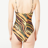 Back view of KABE SHOP INC Lola one-piece swimsuit featuring a tiger stripe print and thin adjustable straps.