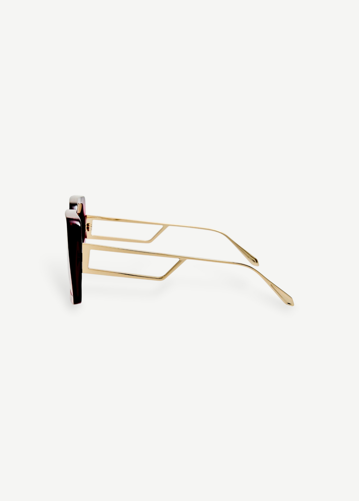 Macy Sunglasses with gold-plated temples, geometric cut-out temple arms, and dark lenses are shown in a side profile view against a plain white background.