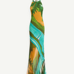 KABE SHOP INC Magdalena long silk maxi dress featuring a halter neckline and a vibrant landscape print