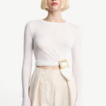 Model wearing a white long-sleeve top cinched at the waist with a KABE SHOP INC Sculpted Slide gold square ring.