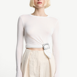 KABE SHOP INC Sculpted Slide gold square ring cinching a white long-sleeve top on a blonde model