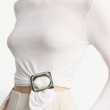 KABE SHOP INC Sculpted Slide, a polished gold square ring cinching a white long-sleeve top for a refined look.